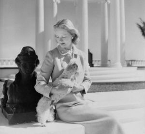 CZ Guest photographed by her friend Cecil Beaton with one of her beloved dogs in 1951.jpg